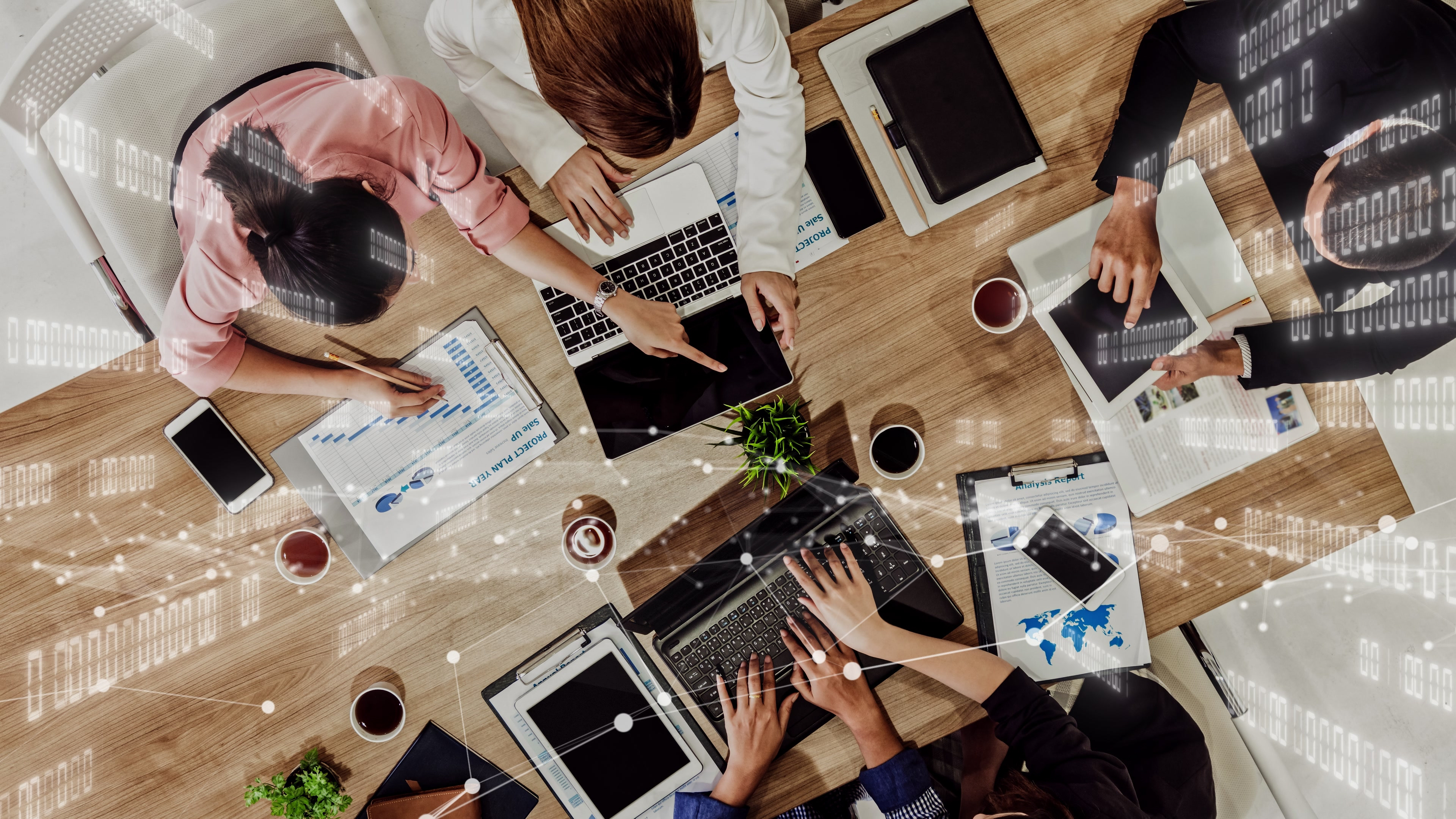 Employees engaged in a meeting.