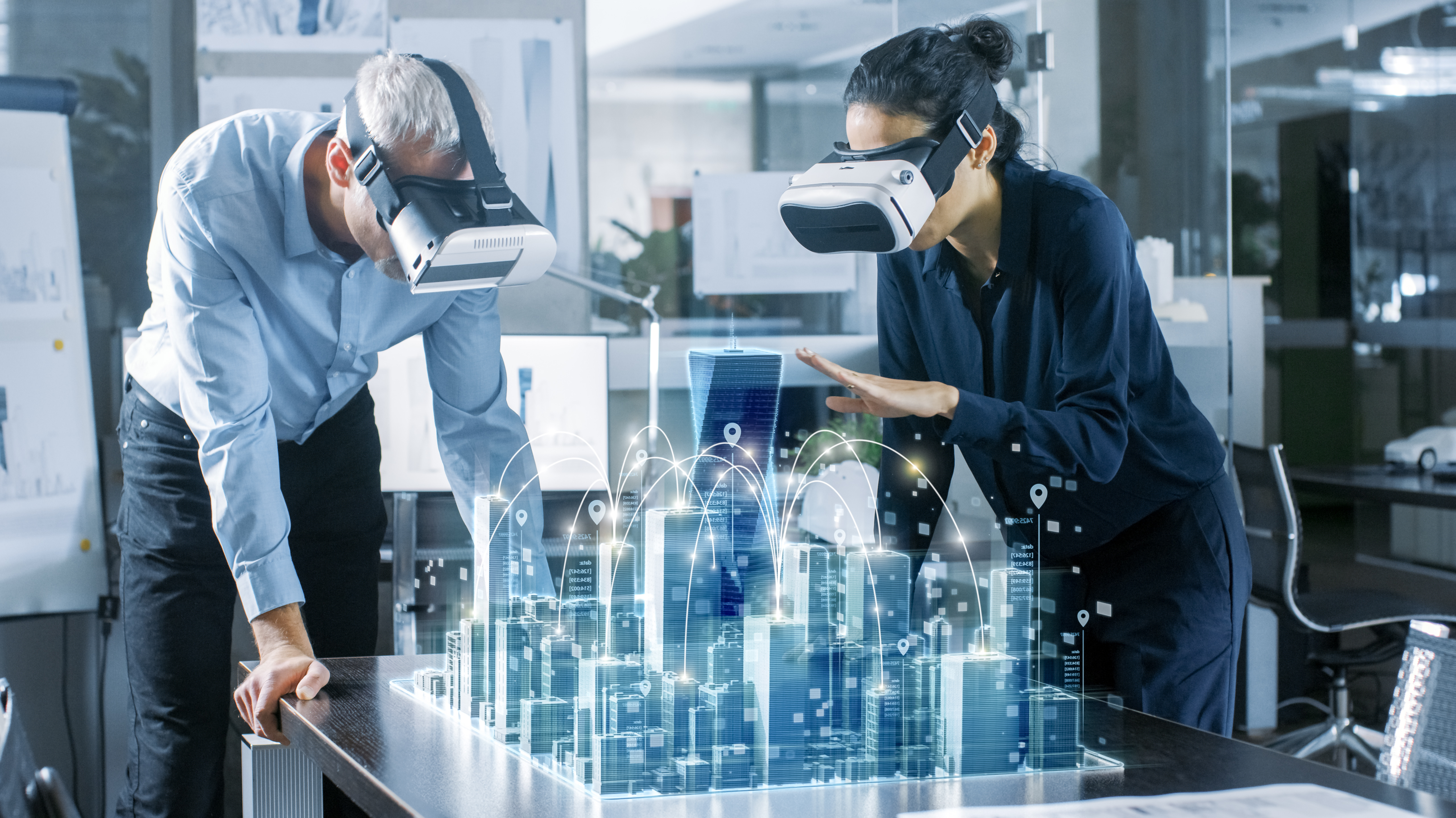 People looking over VR cityscape